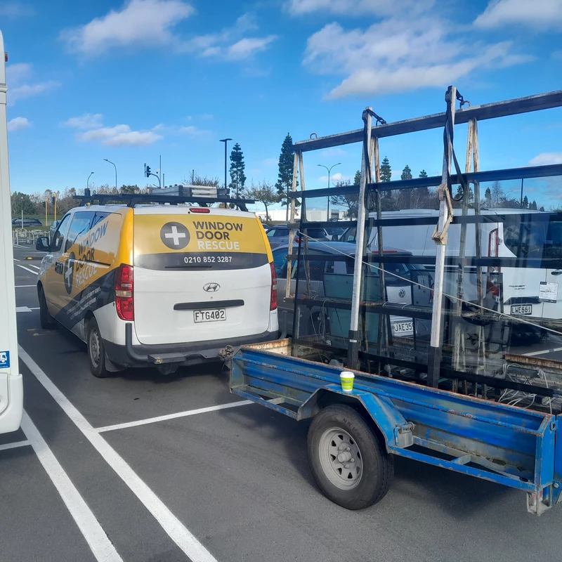 Window and Door Rescue van with glass transport trailer
